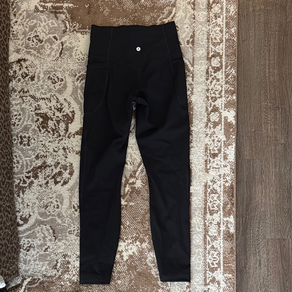 Halara Black High-Waisted Booty lifting Leggings 7/8 length

I have 2 pairs.